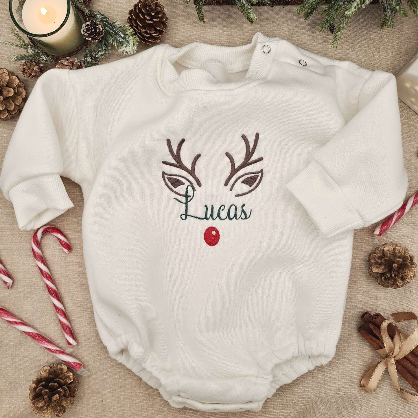 Embroidered Reindeer Baby Romper in size 0-3 months, displayed flat.