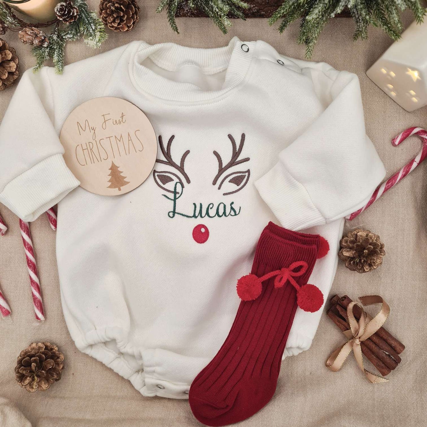 Red socks accessory option alongside the Embroidered Reindeer Baby Romper.