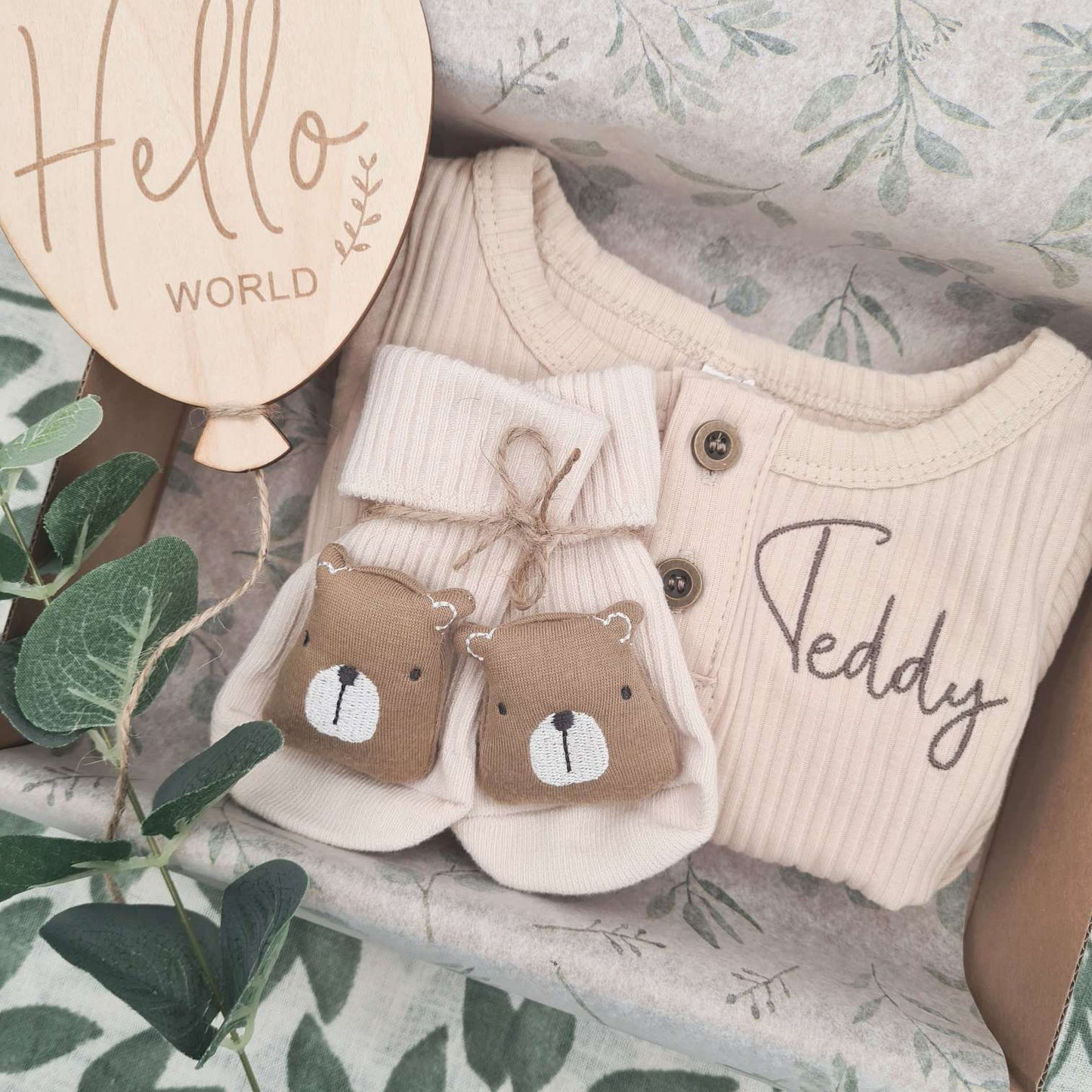 Lifestyle Image of Teddy Bear Themed Baby Romper Set in Use
