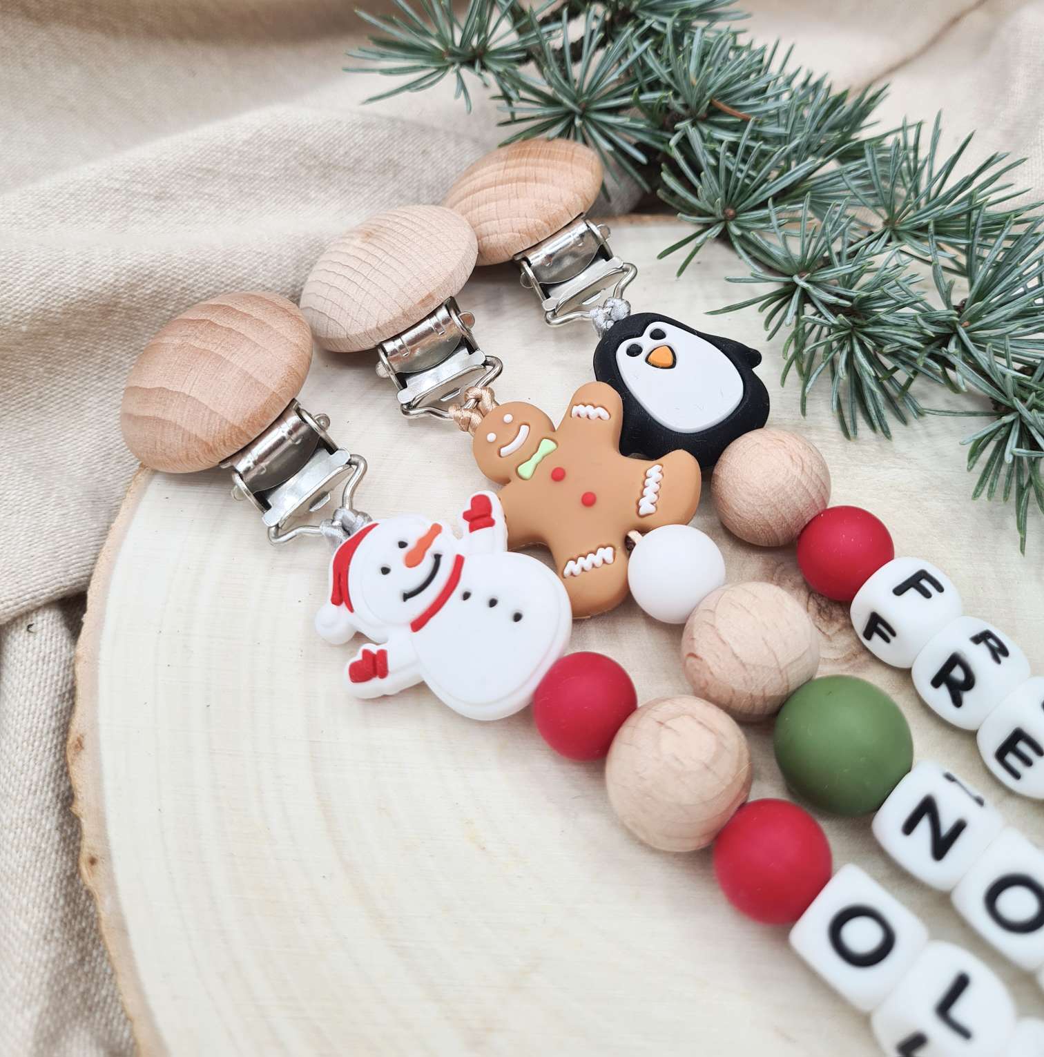 Eco-friendly Christmas dummy clip made from natural wood.