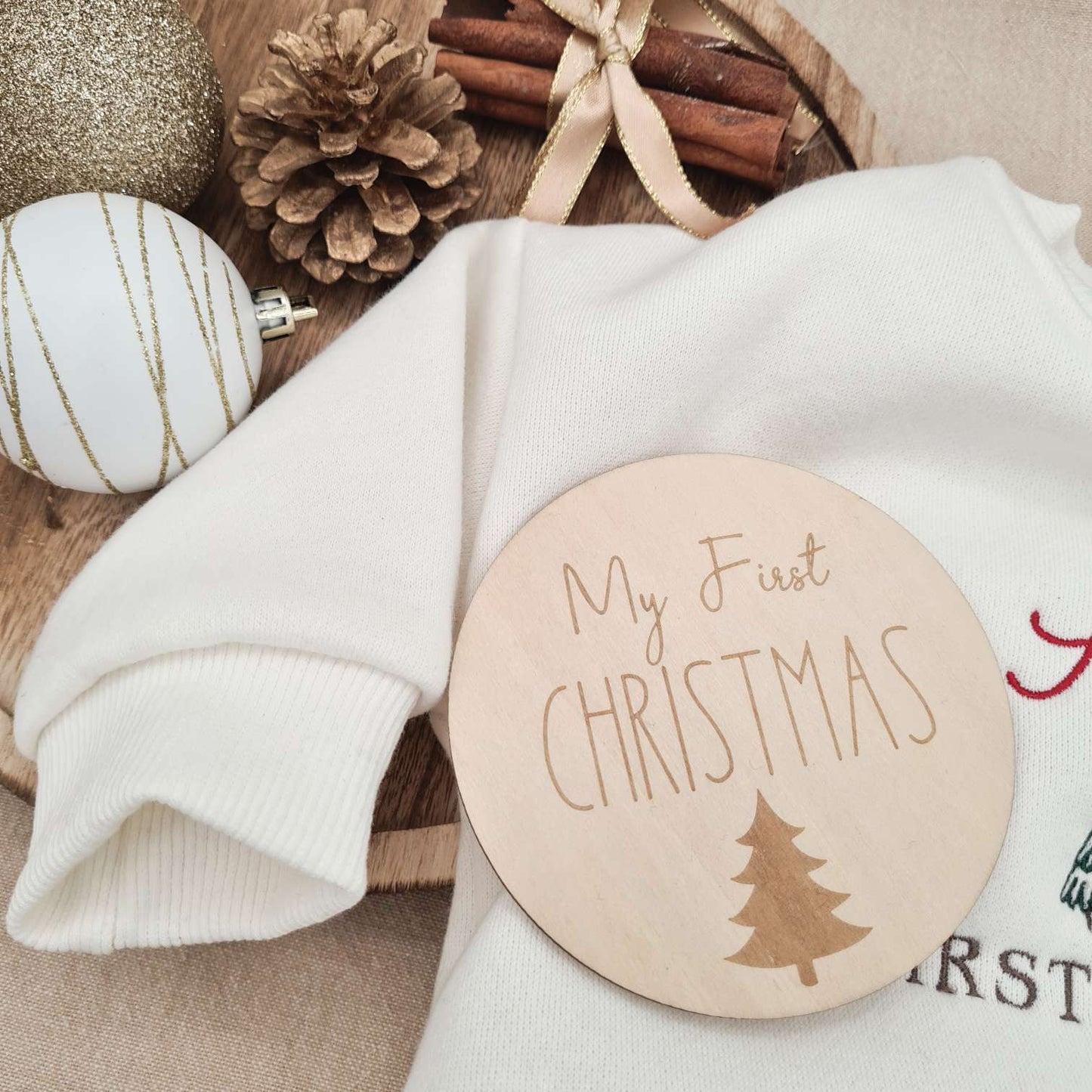 Wooden 'First Christmas' milestone sign with the Baby Romper.