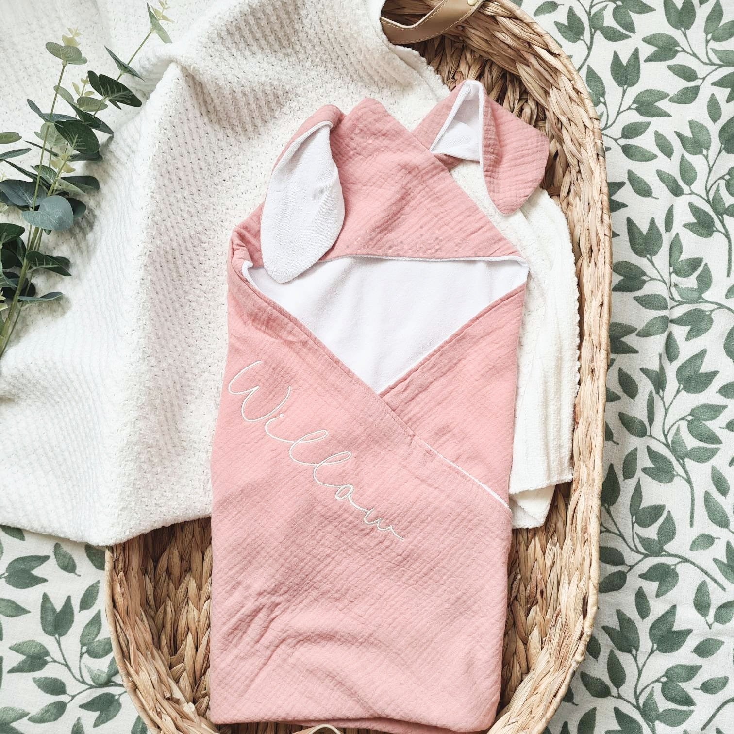 Pink personalised hooded baby towel with bunny ears and embroidered name 'Willow'. Soft cotton terry and muslin, perfect for babies.